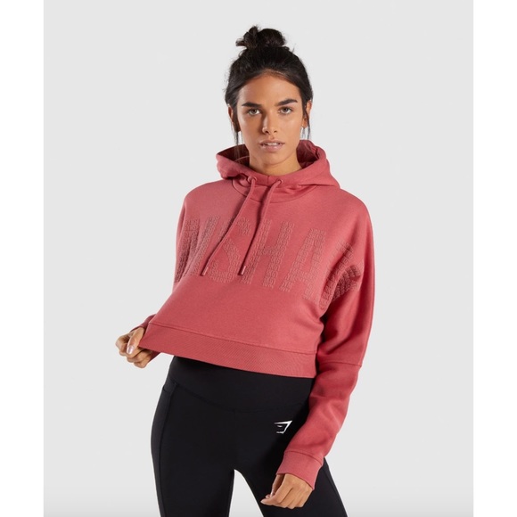 Gymshark Tops - GYMSHARK Repeat Print Crop Pullover in Rose Brick